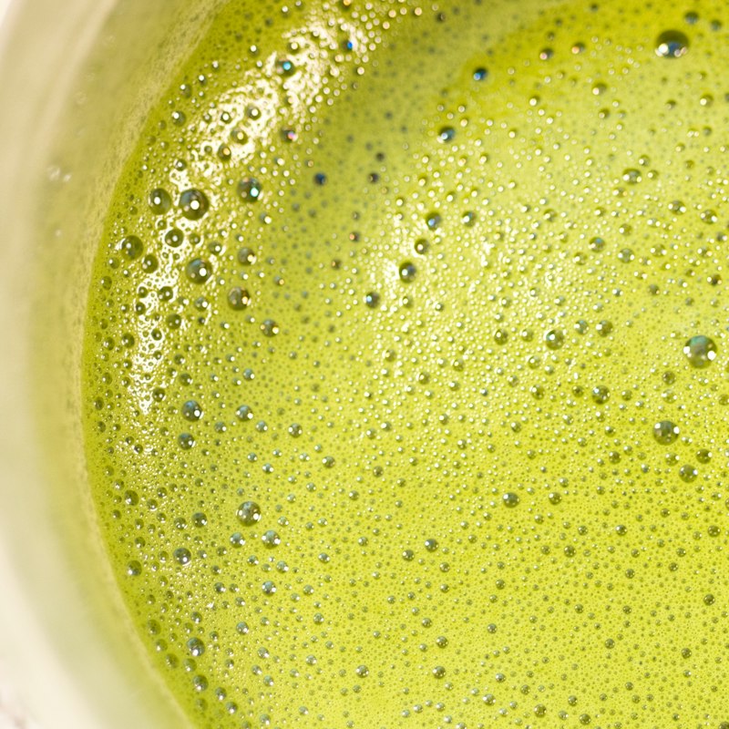 A bowl of freshly whisked matcha, seen from above